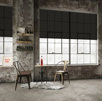 photograph of Draper FlexStyle roller shades in a relaxed setting