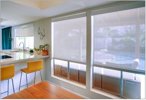photograph of Draper FlexStyle roller shades in a relaxed setting