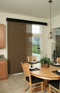 Elance sliding panels on a large window