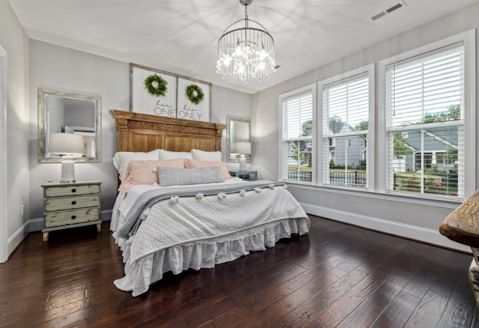 Gorgeous image of wood blinds in a lovely setting